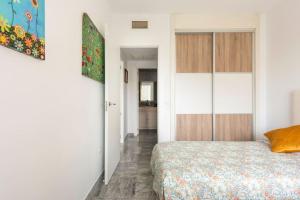 Posteľ alebo postele v izbe v ubytovaní Lorcrimar 3 Apto cerca de la playa con piscina