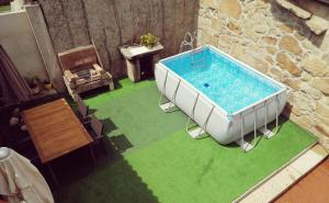 an overhead view of a bath tub in a room at La Veiga Romana in Tui