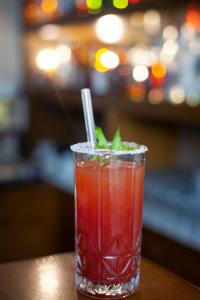 a drink sitting on top of a table at Abc Hotel in Thessaloniki