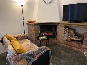TV a/nebo společenská místnost v ubytování ASV Apartments