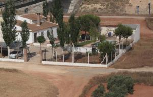 an overhead view of a house with trees in the yard at Casa Rural La Rosa de los Vientos in Fuente de Piedra