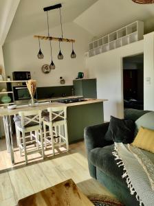 Kuchyň nebo kuchyňský kout v ubytování Maisonnette neuve plage et commerces à pied