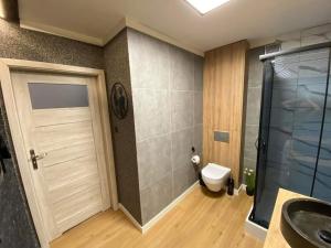 Ένα μπάνιο στο Uroczy apartament blisko Zalewu-Lublin