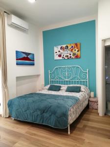 Postel nebo postele na pokoji v ubytování casa dei gemelli