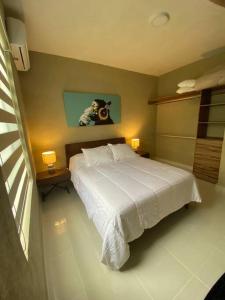 Ένα ή περισσότερα κρεβάτια σε δωμάτιο στο Tangerine Tulum House: Pools, Zamna, Wi-Fi, Cenote +32 φωτογραφίες