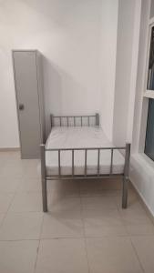Postel nebo postele na pokoji v ubytování الامارات العربيه المتحده - عجمان