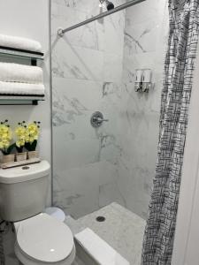 Ein Badezimmer in der Unterkunft Incredible comfortable apartments near the airport and beaches