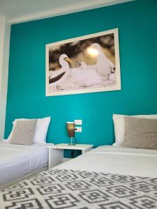 Voodi või voodid majutusasutuse Hotel-Restaurante Ancora toas