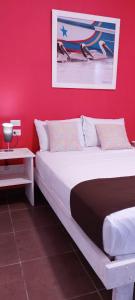 Voodi või voodid majutusasutuse Hotel-Restaurante Ancora toas