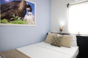 Voodi või voodid majutusasutuse Hotel-Restaurante Ancora toas