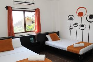 Tempat tidur dalam kamar di Hotel-Restaurante Ancora