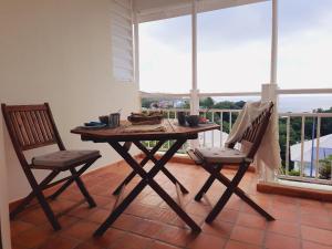 Balcó o terrassa a Martinique La Trinité KAZAKASSY Studio plain-pied, fonctionnel et vue mer