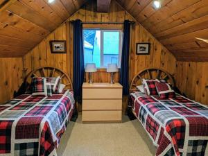 Postel nebo postele na pokoji v ubytování Cabin #4