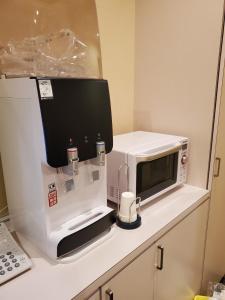 Hotel Rakuseki Honkan的厨房或小厨房
