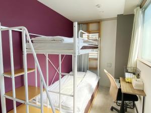 Postel nebo postele na pokoji v ubytování Hotel Mikado