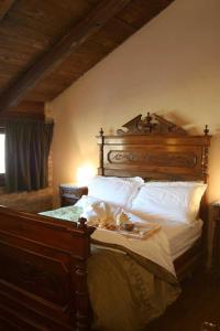 Posteľ alebo postele v izbe v ubytovaní Locanda Del Molino Vecchio + 37 fotografií