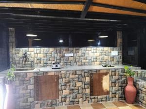 Kuchyň nebo kuchyňský kout v ubytování Pearl House
