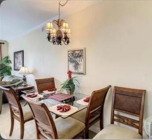 a dining room with a table and chairs at Disney just 1 and a quarter mile away, Blue Heron 1 room 2 bath,amenities,6 guests, walk to restaurants in Orlando