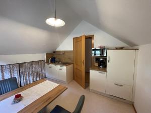 Kuchyň nebo kuchyňský kout v ubytování Ferienwohnung Syen