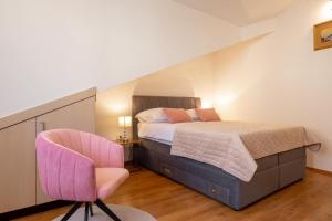 Postel nebo postele na pokoji v ubytování PENTHOUSE J&A