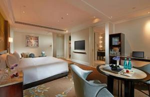 TV i/ili multimedijalni sistem u objektu Wen Ling International Hotel