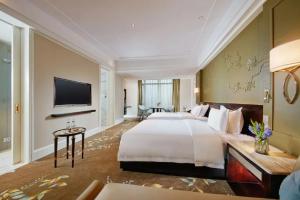 TV i/ili multimedijalni sistem u objektu Wen Ling International Hotel