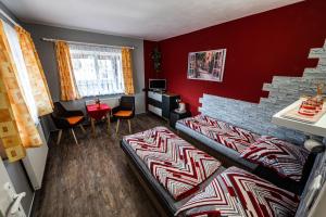 Postel nebo postele na pokoji v ubytování Penzion U Tulaka