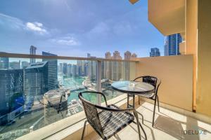 Balkón nebo terasa v ubytování Charming Studio at The Address Residences Dubai Marina by Deluxe Holiday Homes