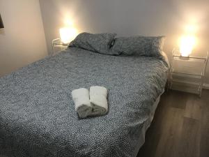 Postel nebo postele na pokoji v ubytování Camelot 18