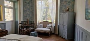 Posteľ alebo postele v izbe v ubytovaní Chateau de Viviez