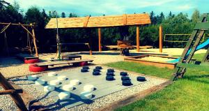 Ο χώρος παιχνιδιού για παιδιά στο Domki Pszczółka