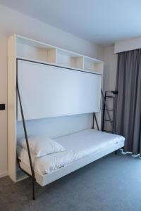 Postel nebo postele na pokoji v ubytování Hotel Apostroff