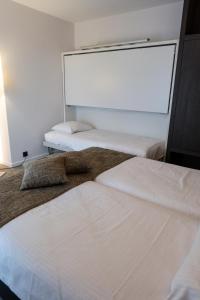 Postel nebo postele na pokoji v ubytování Hotel Apostroff