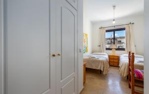 A bed or beds in a room at Marina Duquesa 2411 Penthouse