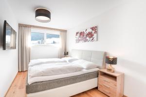 Posteľ alebo postele v izbe v ubytovaní Penthouse Ski&Nature "Weisseneck"