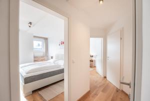 Posteľ alebo postele v izbe v ubytovaní Penthouse Ski&Nature "Weisseneck"
