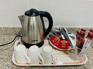 Παροχές για τσάι/καφέ στο Summit Hotel Suites - القمة للأجنحة الفندقيه