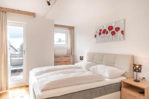 Posteľ alebo postele v izbe v ubytovaní Penthouse Ski&Nature "Weisseneck"