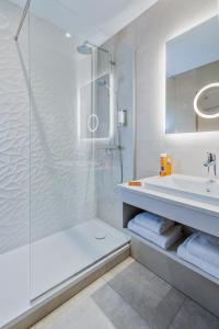 Koupelna v ubytování Hôtel Valdys Thalasso & Spa - Beau rivage