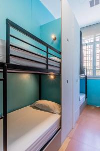 a bunk bed room with two bunk beds at Hostel Center Madrid in Madrid