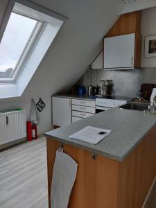 Een keuken of kitchenette bij Rosengård