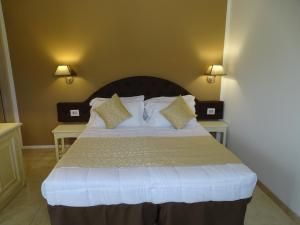 Ліжко або ліжка в номері Locanda Domus De Vida Turismo Rurale