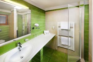 Koupelna v ubytování Hotel Kaskáda