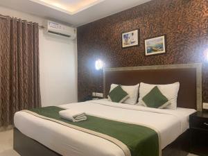 Postel nebo postele na pokoji v ubytování Hotel Greenlife