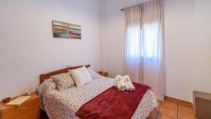 Łóżko lub łóżka w pokoju w obiekcie Casa Cerrito Prado del Rey by Ruralidays