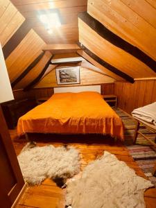 a room with a bed and a rug on the floor at Casa Roberto Corippo 