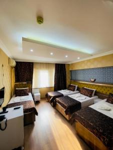 Postel nebo postele na pokoji v ubytování Meta Hotel