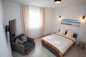 Posteľ alebo postele v izbe v ubytovaní Stilo Hotel