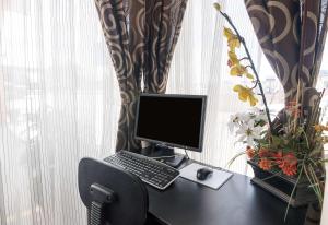 TV a/nebo společenská místnost v ubytování Econo Lodge Dalhart Hwy 54 - Hwy 287