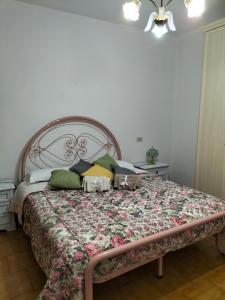 A bed or beds in a room at L'oca Nera